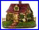 LATE_19TH_C_ANTIQUE_CAST_IRON_COTTAGE_DOORSTOP_IN_ORIG_PAINT_WithFENCING_FLOWERS_01_cpx