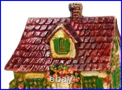 LATE 19TH C ANTIQUE CAST IRON COTTAGE DOORSTOP IN ORIG PAINT, WithFENCING, FLOWERS