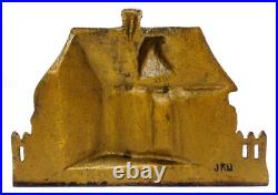 LATE 19TH C ANTIQUE CAST IRON COTTAGE DOORSTOP IN ORIG PAINT, WithFENCING, FLOWERS