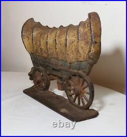 Large antique 1930 original hand painted cast iron covered wagon doorstop