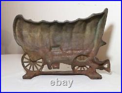 Large antique 1930 original hand painted cast iron covered wagon doorstop