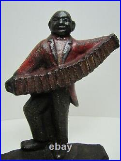 Musician Accordion Player Antique Cast Iron Doorstop Spencer Guilford Conn