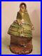Old_Antique_Hubley_Cast_Iron_Doorstop_Woman_With_Purse_296_01_yfgs