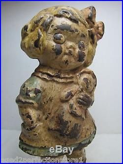 Old Cast Iron'Dolly' Doorstop little girl w doll original old paint detailed