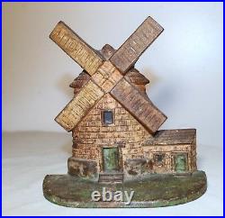 Original antique hand painted heavy cast iron figural windmill house doorstop