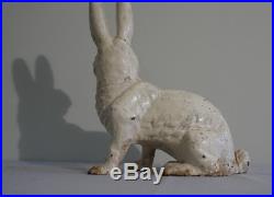 Painted cast iron seated rabbit figure doorstop American late 19th early 20thc