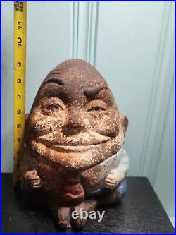 Painted figural Cast Iron Humpty Dumpty Doorstop. 9 3/8 H. American, early 20th