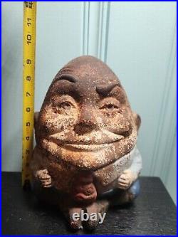 Painted figural Cast Iron Humpty Dumpty Doorstop. 9 3/8 H. American, early 20th