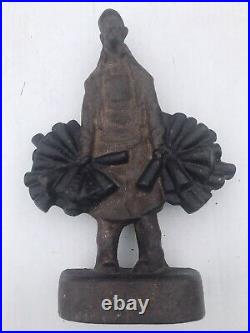 Rare Antique Cast Iron Doorstop Merchant With Vine Bottles