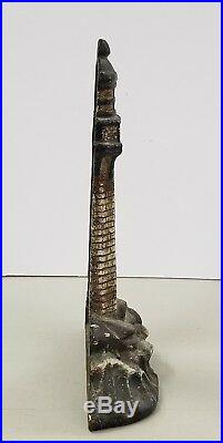 Rare Antique Cast Iron Figural Light House Doorstop With Waves Crashing on Rocks
