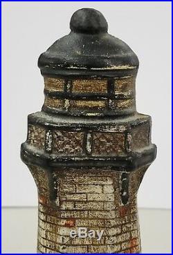 Rare Antique Cast Iron Figural Light House Doorstop With Waves Crashing on Rocks