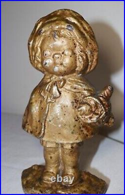 Rare antique late 1800's solid cast iron girl with basket heavy figural doorstop