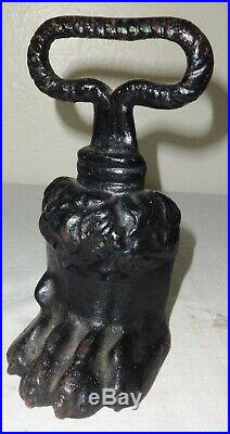 Unusual Antique Cast Iron Figural Lion's Paw Door Stop Stamped with a Cross