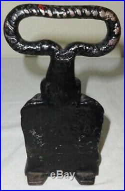 Unusual Antique Cast Iron Figural Lion's Paw Door Stop Stamped with a Cross