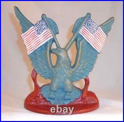 Vintage Cast Iron Doorstop USA Spread Wing Eagle Standing Two American Flags