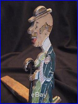 Vintage Dapper Dan Cast Iron doorstop w Wood wedge #1256 painted relief man cane