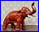 Vintage_Red_Cast_Iron_Elephant_Doorstop_8_1_2_Long_Trunk_Up_For_Luck_Hubley_01_tsml