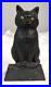 Vintage_antique_Cast_Iron_Black_Guard_Cat_Sitting_On_Trapezoid_Base_01_gfcq