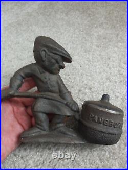 Vintage cast iron Pangborn Hagerstown Foundry worker doorstop paperweight